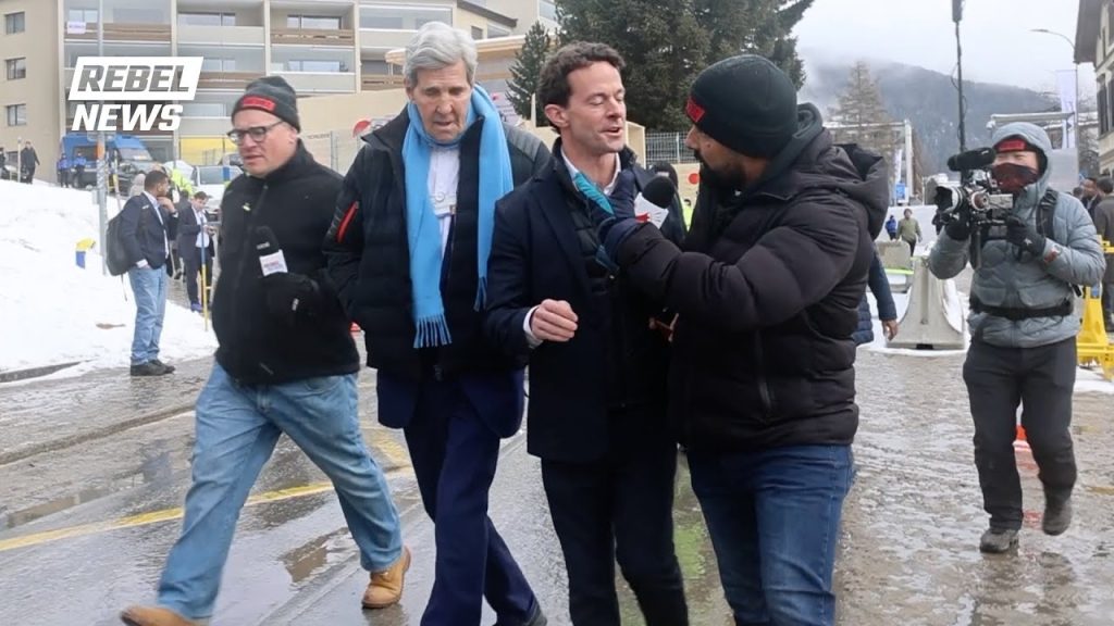 John Kerry AMBUSHED by entire Rebel News team in Davos